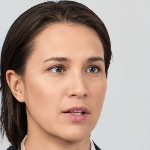 Neutral white young-adult female with medium  brown hair and brown eyes