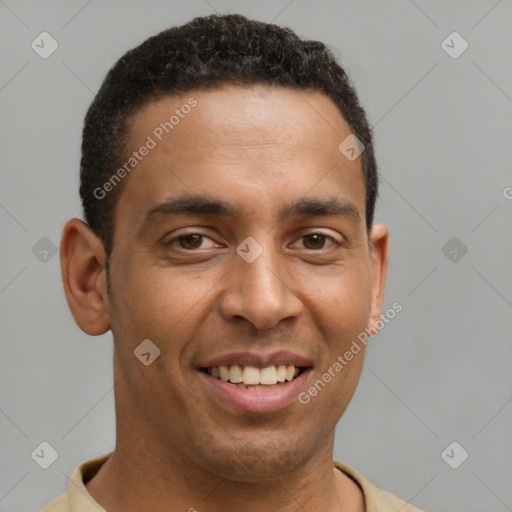 Joyful latino young-adult male with short  brown hair and brown eyes