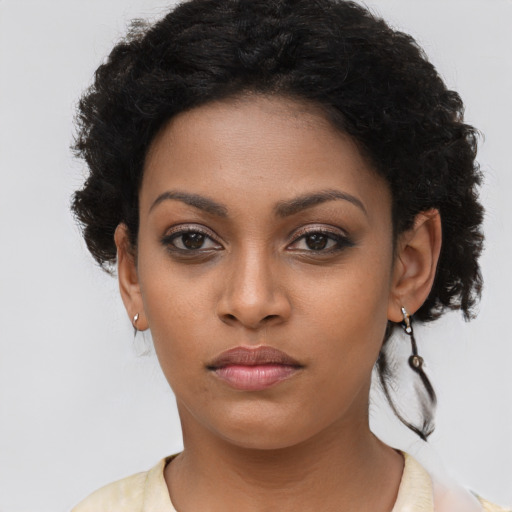 Neutral latino young-adult female with long  brown hair and brown eyes