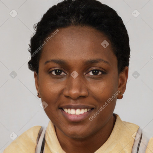 Joyful black young-adult female with short  black hair and brown eyes