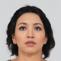 Neutral asian young-adult female with medium  black hair and brown eyes