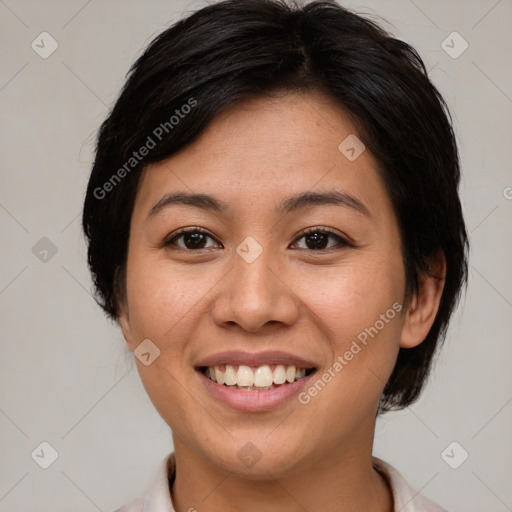 Joyful white young-adult female with medium  brown hair and brown eyes