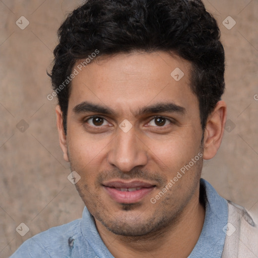 Joyful white young-adult male with short  black hair and brown eyes