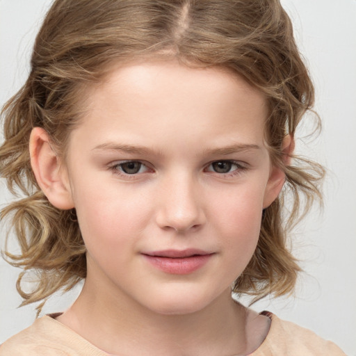 Joyful white child female with medium  brown hair and grey eyes