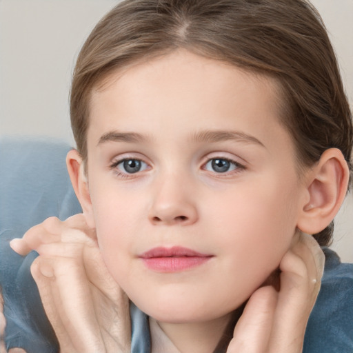 Neutral white child female with medium  brown hair and grey eyes