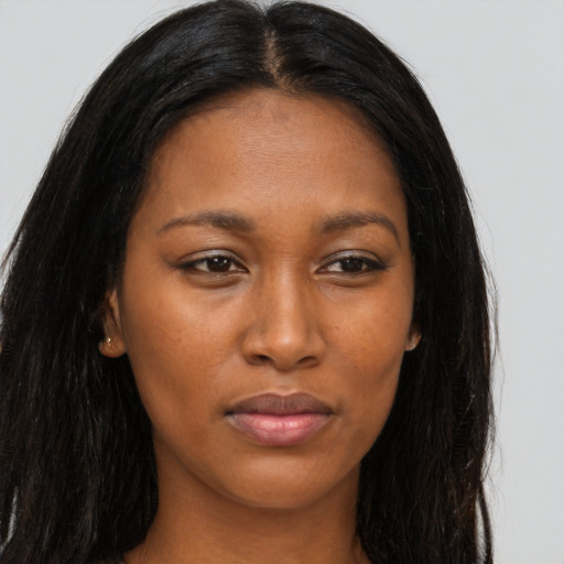 Joyful asian young-adult female with long  brown hair and brown eyes