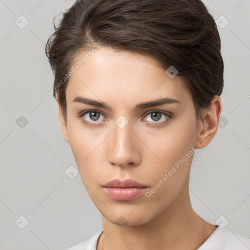 Neutral white young-adult female with short  brown hair and brown eyes