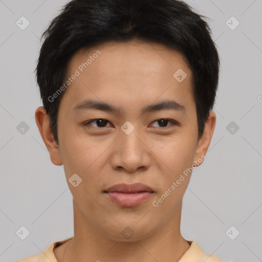 Joyful asian young-adult male with short  brown hair and brown eyes