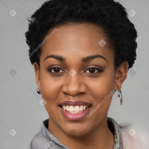 Joyful black young-adult female with short  black hair and brown eyes