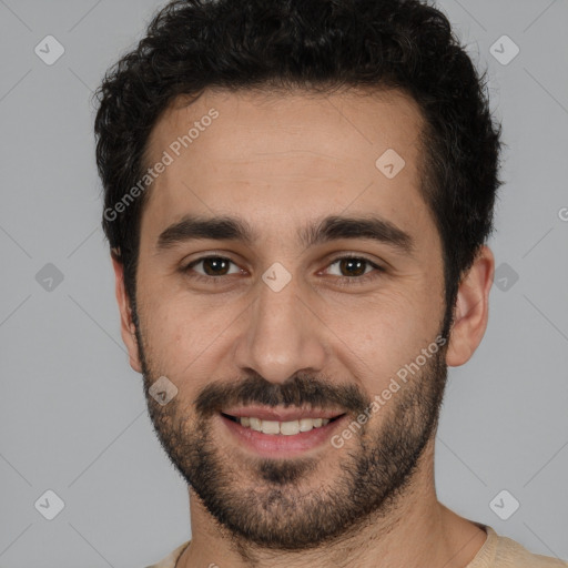 Joyful white young-adult male with short  black hair and brown eyes