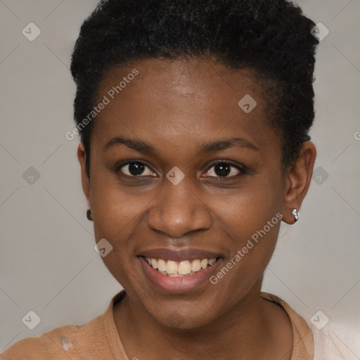 Joyful black young-adult female with short  brown hair and brown eyes