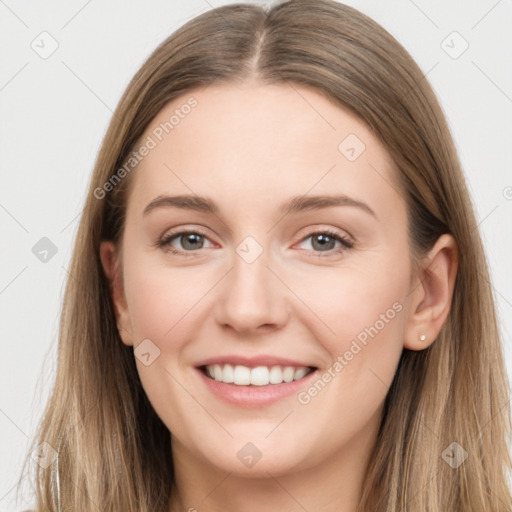 Joyful white young-adult female with long  brown hair and grey eyes