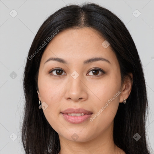 Joyful asian young-adult female with long  brown hair and brown eyes