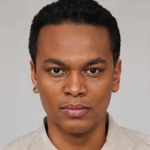Neutral black young-adult male with short  black hair and brown eyes
