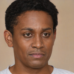 Neutral black young-adult male with short  brown hair and brown eyes