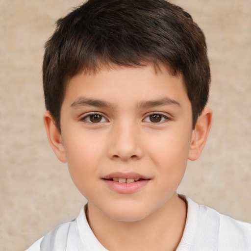 Joyful white child male with short  brown hair and brown eyes