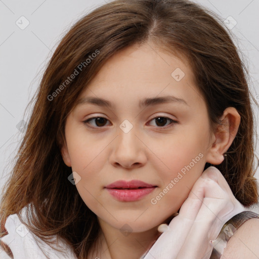 Joyful white child female with medium  brown hair and brown eyes