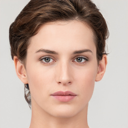 Neutral white young-adult female with short  brown hair and brown eyes