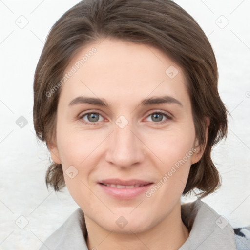 Joyful white young-adult female with medium  brown hair and grey eyes