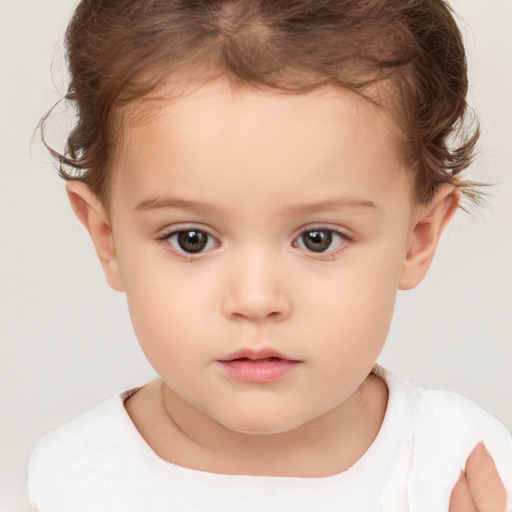 Neutral white child female with short  brown hair and brown eyes