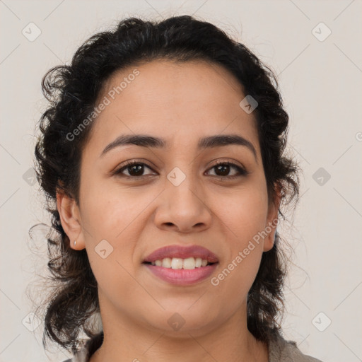 Joyful latino young-adult female with long  brown hair and brown eyes