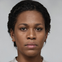 Neutral black young-adult female with short  brown hair and brown eyes