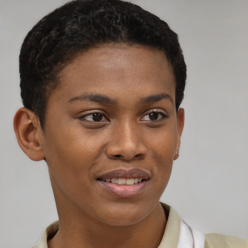 Joyful black young-adult female with short  brown hair and brown eyes