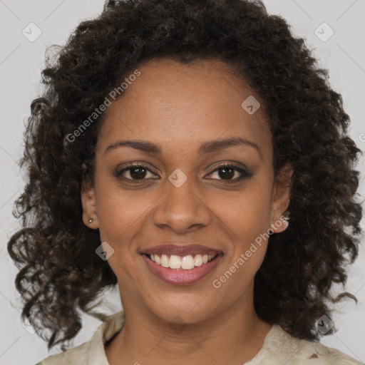 Joyful black young-adult female with medium  brown hair and brown eyes