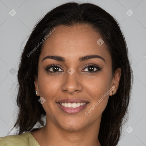 Joyful latino young-adult female with medium  brown hair and brown eyes