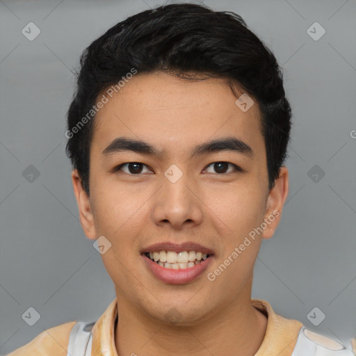 Joyful latino young-adult male with short  black hair and brown eyes