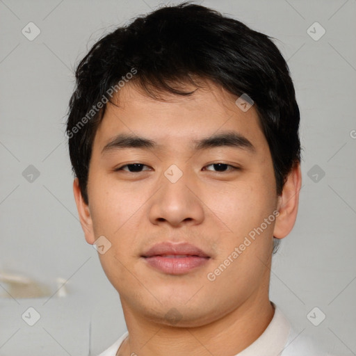 Neutral asian young-adult male with short  black hair and brown eyes