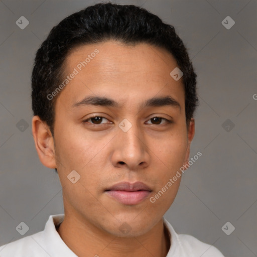 Neutral latino young-adult male with short  brown hair and brown eyes