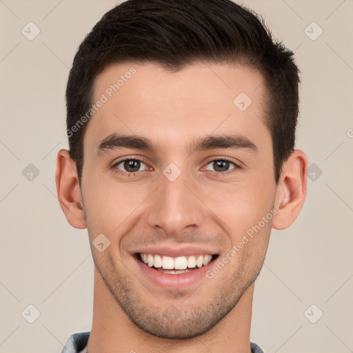 Joyful white young-adult male with short  brown hair and brown eyes