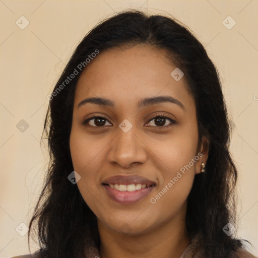 Joyful latino young-adult female with long  brown hair and brown eyes