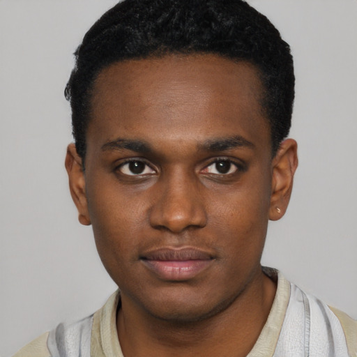 Neutral black young-adult male with short  black hair and brown eyes