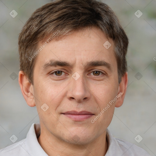 Joyful white adult male with short  brown hair and brown eyes