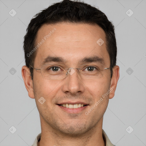 Joyful white adult male with short  brown hair and brown eyes