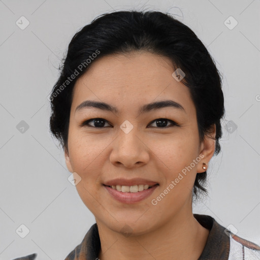 Joyful asian young-adult female with medium  black hair and brown eyes