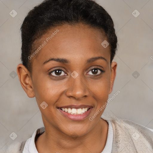 Joyful black young-adult female with short  brown hair and brown eyes