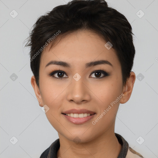 Joyful asian young-adult female with short  black hair and brown eyes