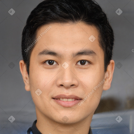 Joyful asian young-adult male with short  brown hair and brown eyes