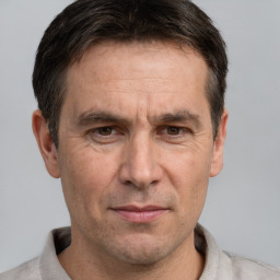 Neutral white adult male with short  brown hair and brown eyes