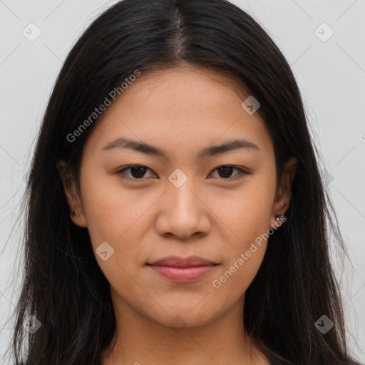 Joyful asian young-adult female with long  brown hair and brown eyes