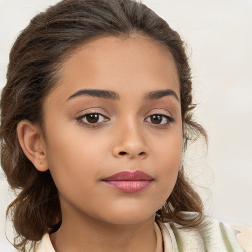 Joyful white child female with medium  brown hair and brown eyes