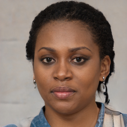 Neutral black young-adult female with short  black hair and brown eyes