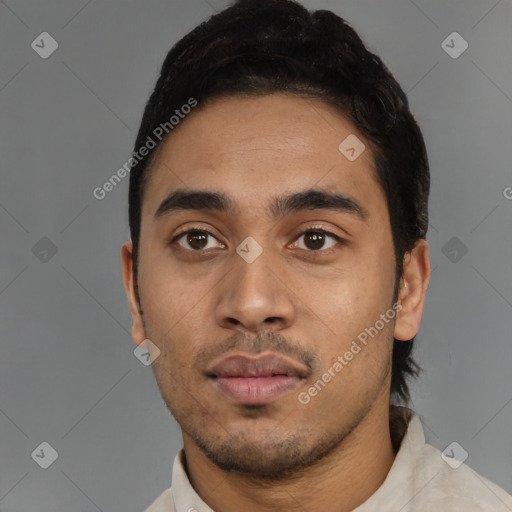 Neutral latino young-adult male with short  black hair and brown eyes