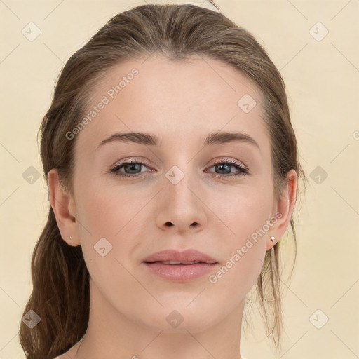 Joyful white young-adult female with medium  brown hair and grey eyes