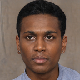 Neutral black young-adult male with short  black hair and brown eyes