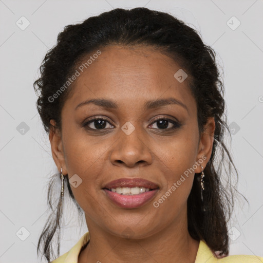 Joyful black young-adult female with medium  brown hair and brown eyes