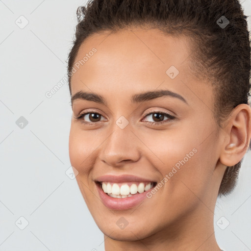 Joyful white young-adult female with short  brown hair and brown eyes